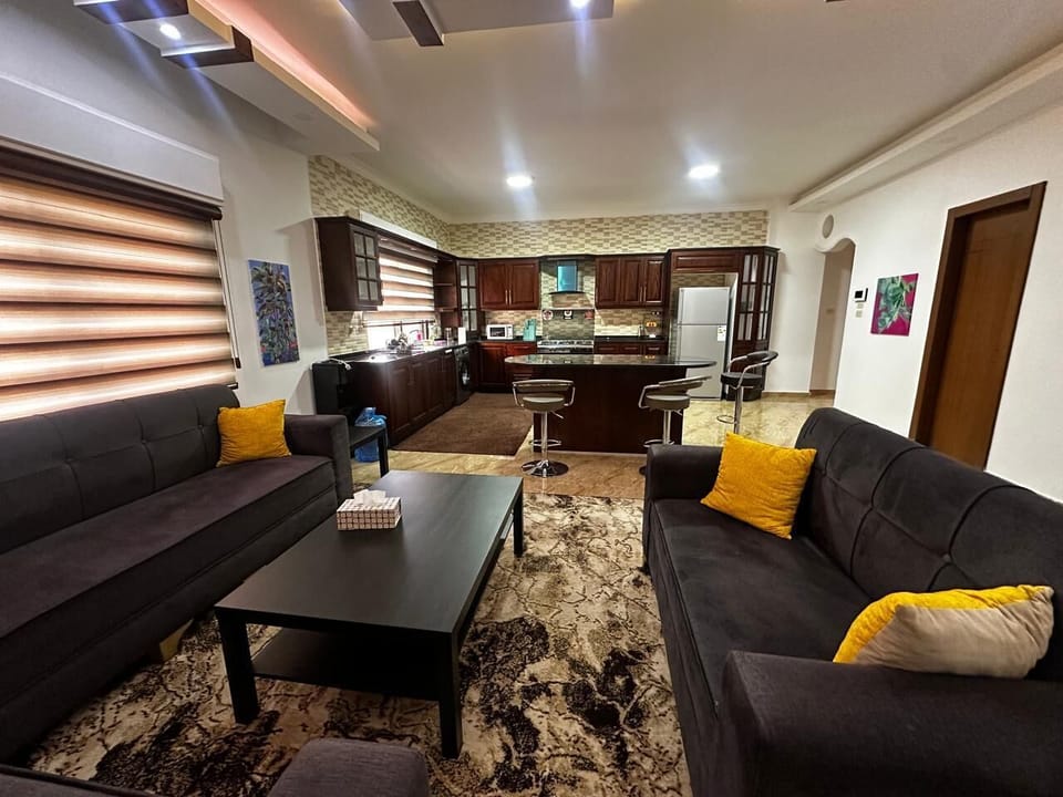 informal family den adjacent to kitchen