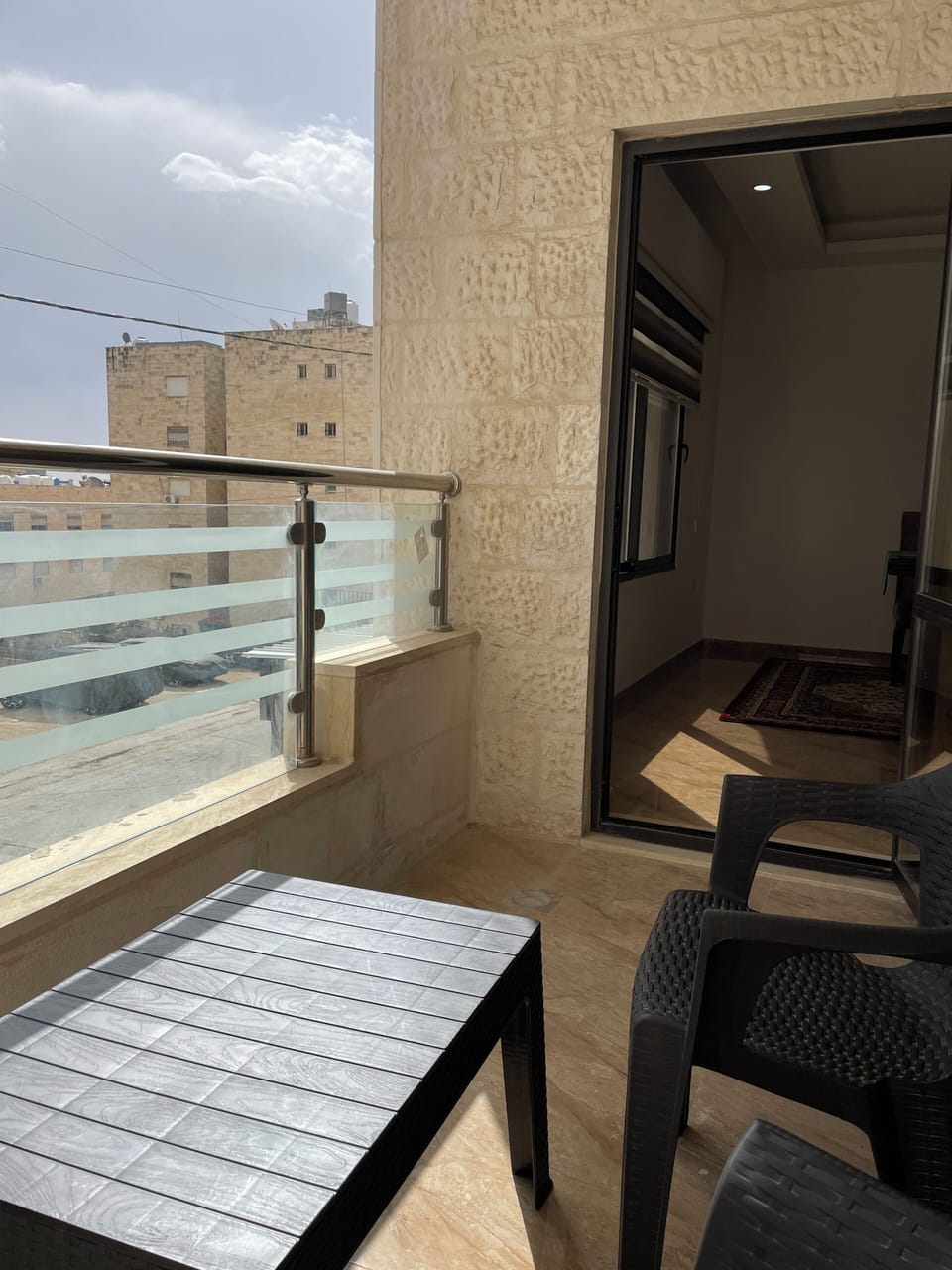 balcony overlooking quiet street