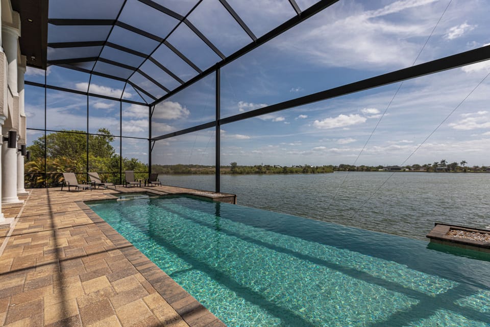 Luxury infinity pool with panoramic water views.