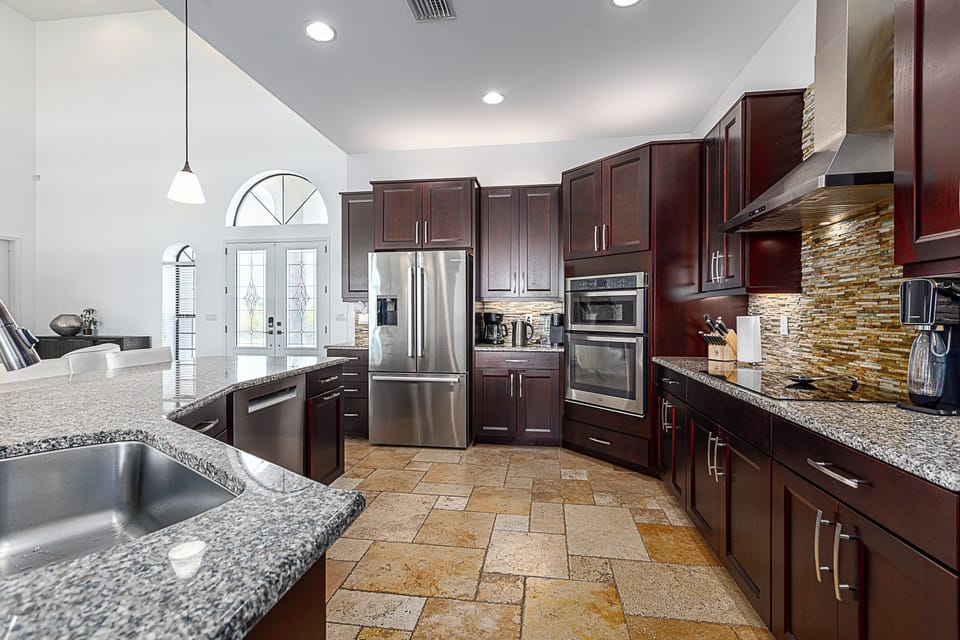 Stainless steel appliances makes this gourmet kitchen shine. 