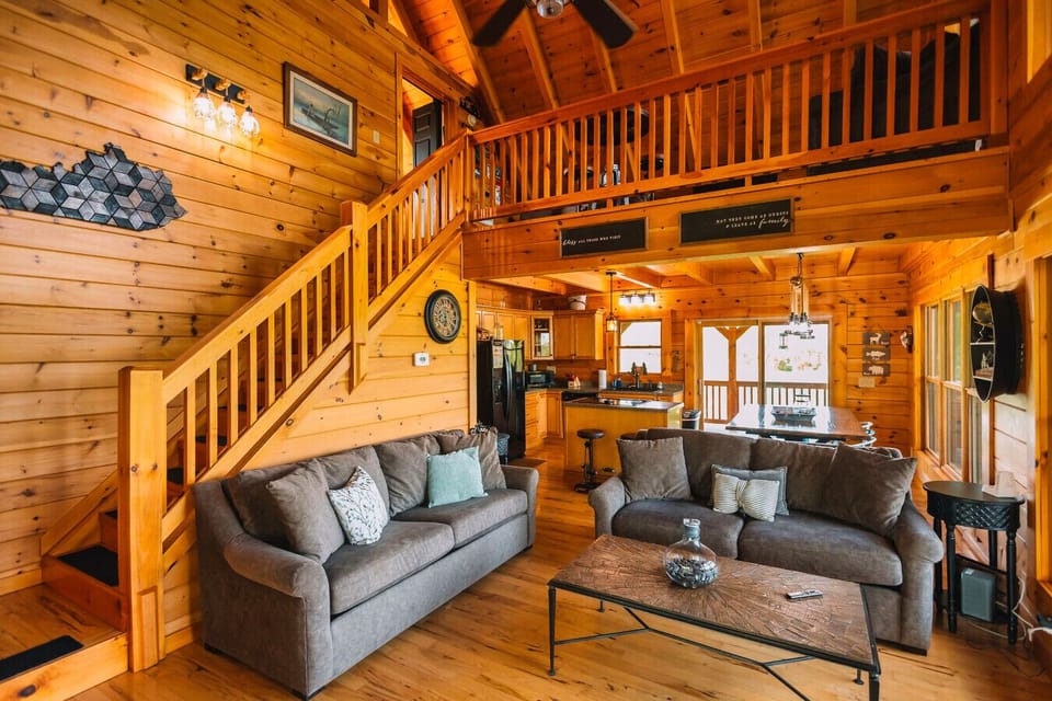 The spacious living room perfect for a movie night after a day of adventure while staying at Pond Paradise