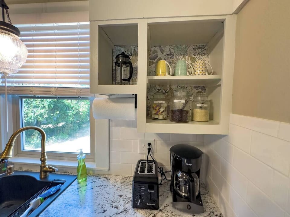 Kitchen. We provide drip coffee maker, French press, and a starter supply of coffee, creamer, and sugar.