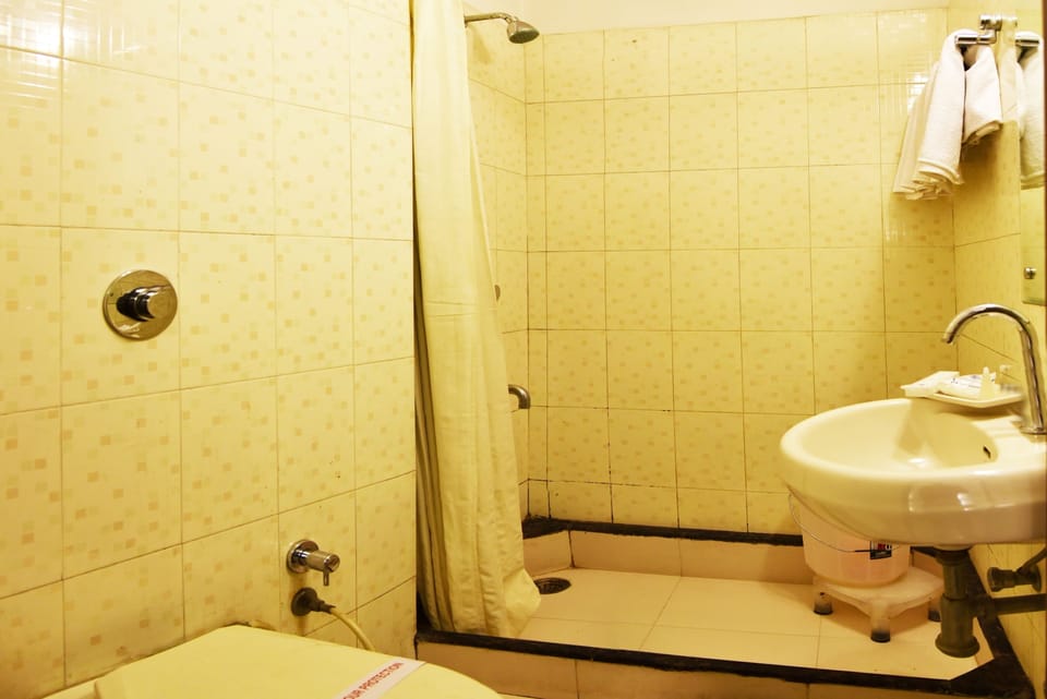 Twin Room, No Windows | Bathroom | Shower, rainfall showerhead, free toiletries, hair dryer