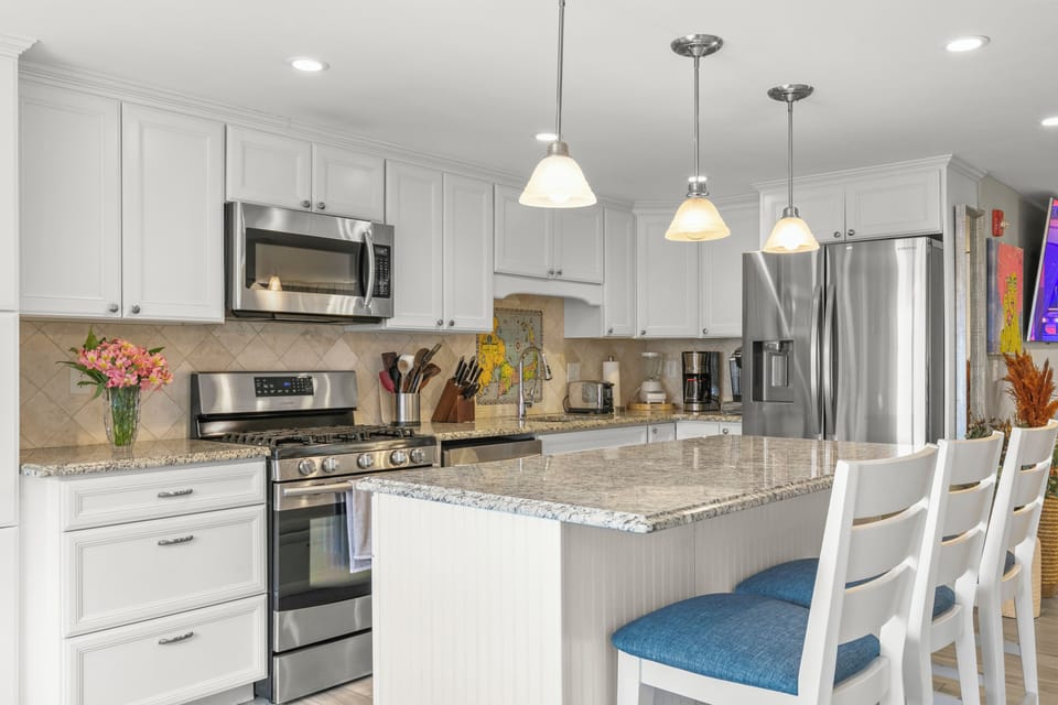 The open-concept kitchen lets you prep meals with ease.