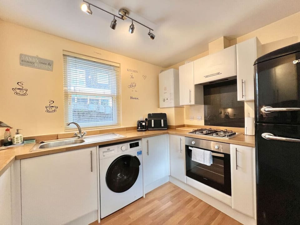 Open plan well equipped kitchen