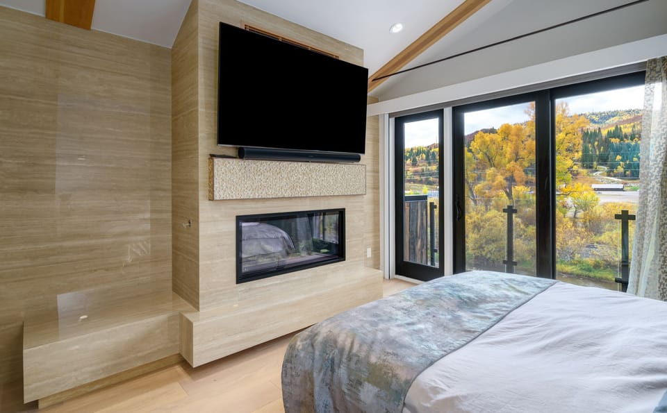 Primary bedroom features a queen size bed, gas fireplace, flat screen TV and private deck, it does not get any better for relaxation!!