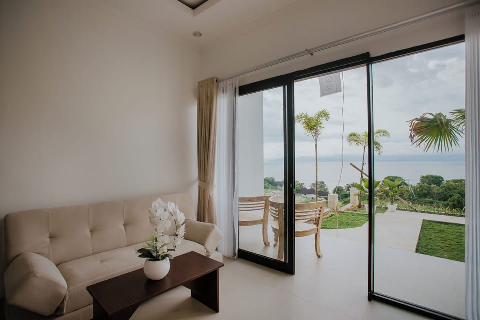Junior Suite, Ocean View | Blackout drapes, iron/ironing board, free WiFi
