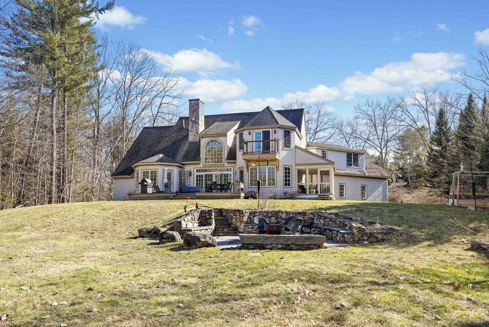The back of the house, with a awesome fire-pit and large yard for games.