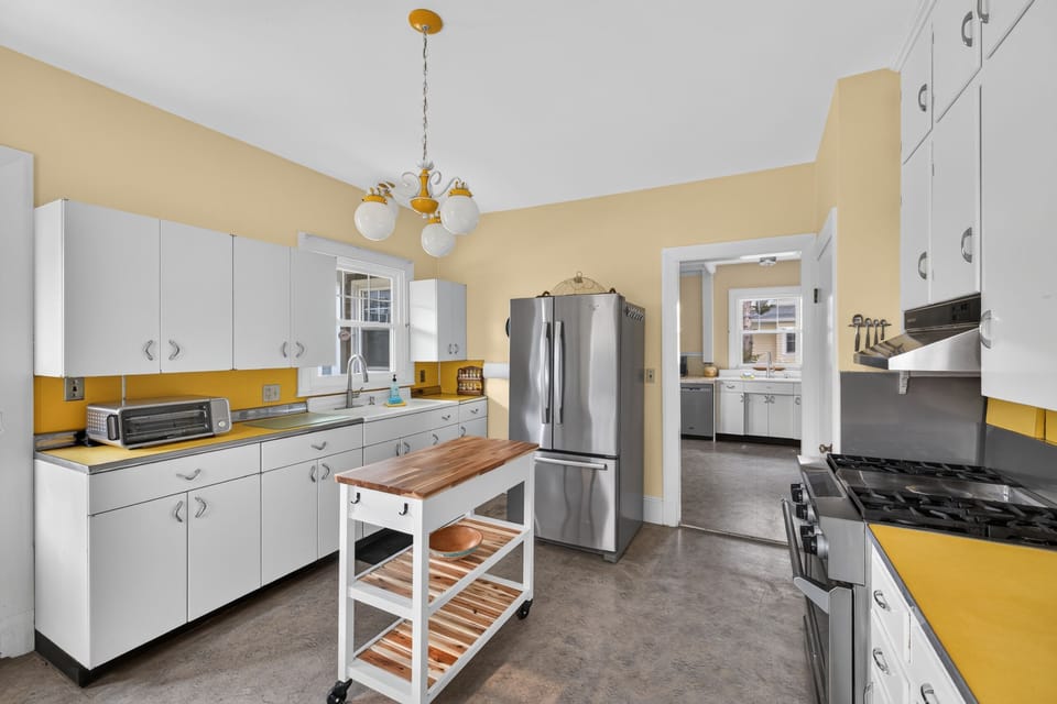 Kitchen with gas range.