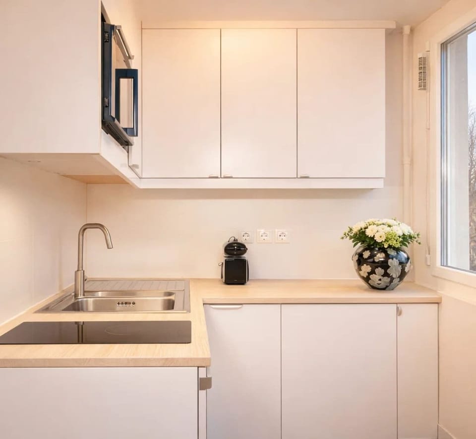 A kitchen ready with utensils and appliances to enhance your cooking experience.