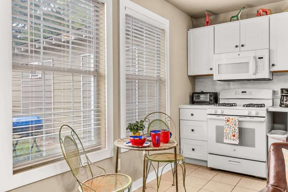 Start your mornings with sunlight and a warm cup of coffee in this cheerful corner nook. A perfect spot to journal, snack, or plan your next adventure—whether it’s Starcke Park, Lake Placid, or nearby San Antonio.