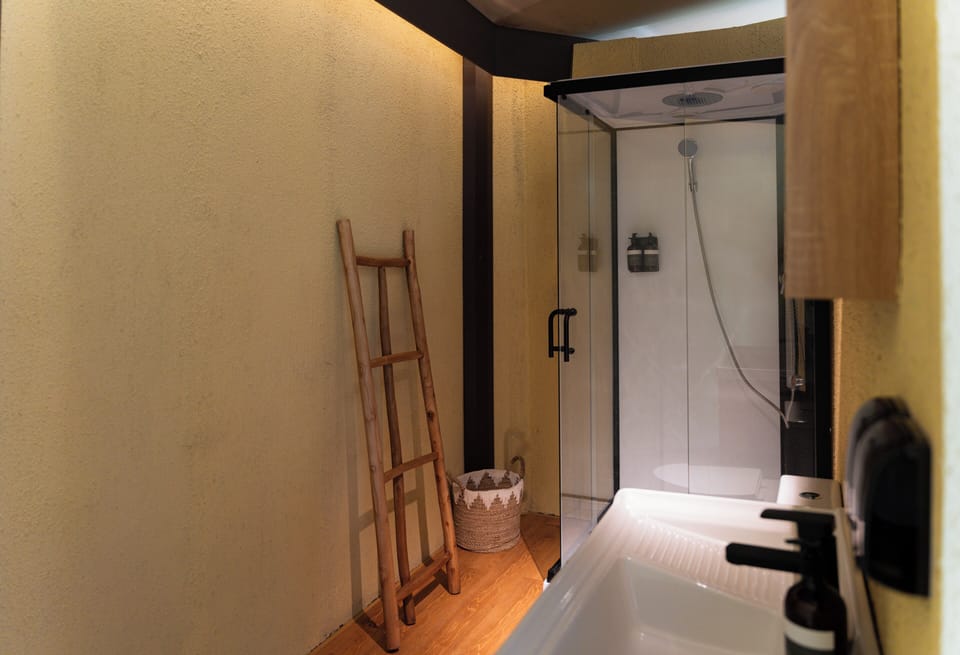 Luxury Tent, 1 King Bed, Oceanfront | Bathroom | Shower, hair dryer, towels, soap