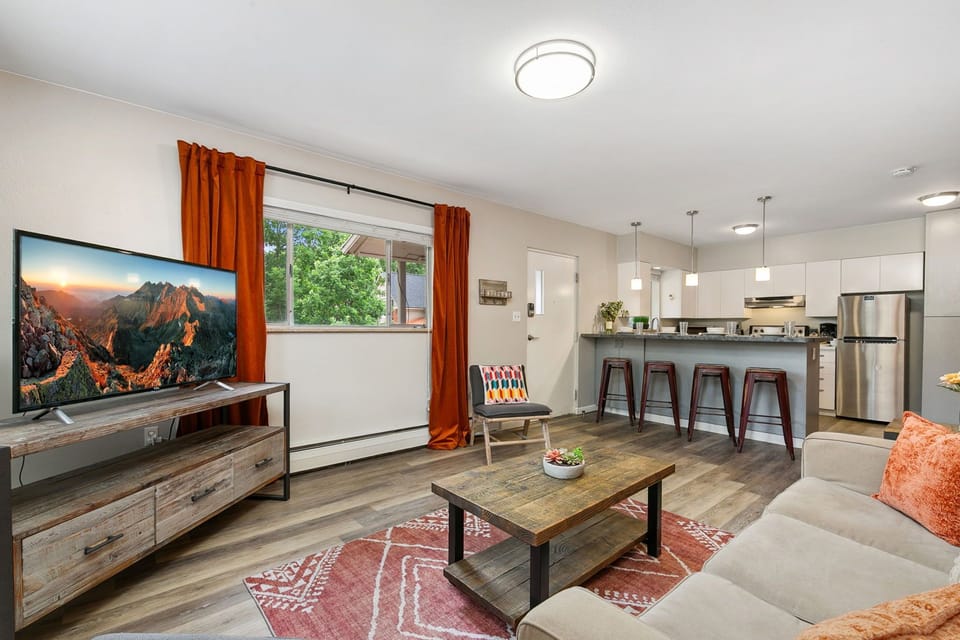 Condo, Multiple Beds, Patio, Garden View (220 Peterson St. (Unit 3,4,7,8)) | Living area | 50-inch flat-screen TV with digital channels