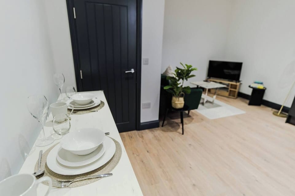 Dining Area: Dining Table, Bar high chairs, plates ,glasses,mugs