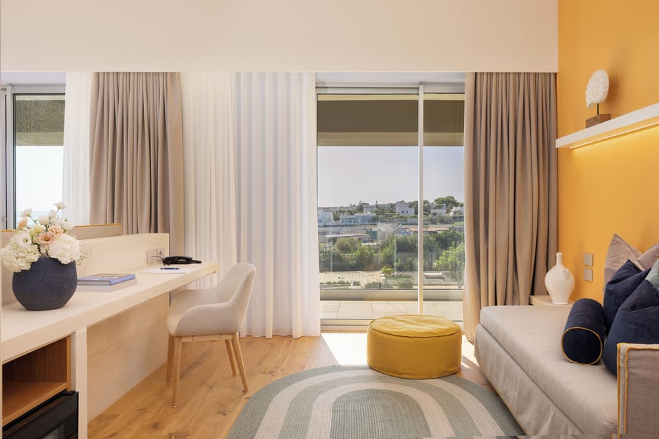Deluxe Suite | Down comforters, in-room safe, individually furnished, desk