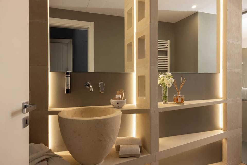 Shower, hair dryer, slippers, towels