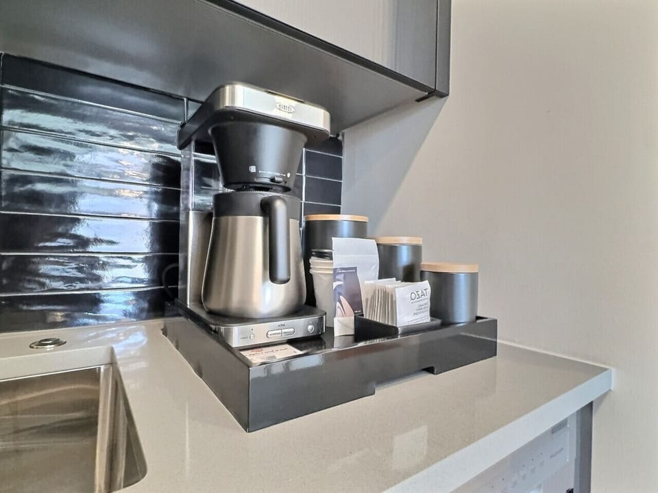 Fresh coffee anytime in the comfort of your room, perfect for a short-term rental.