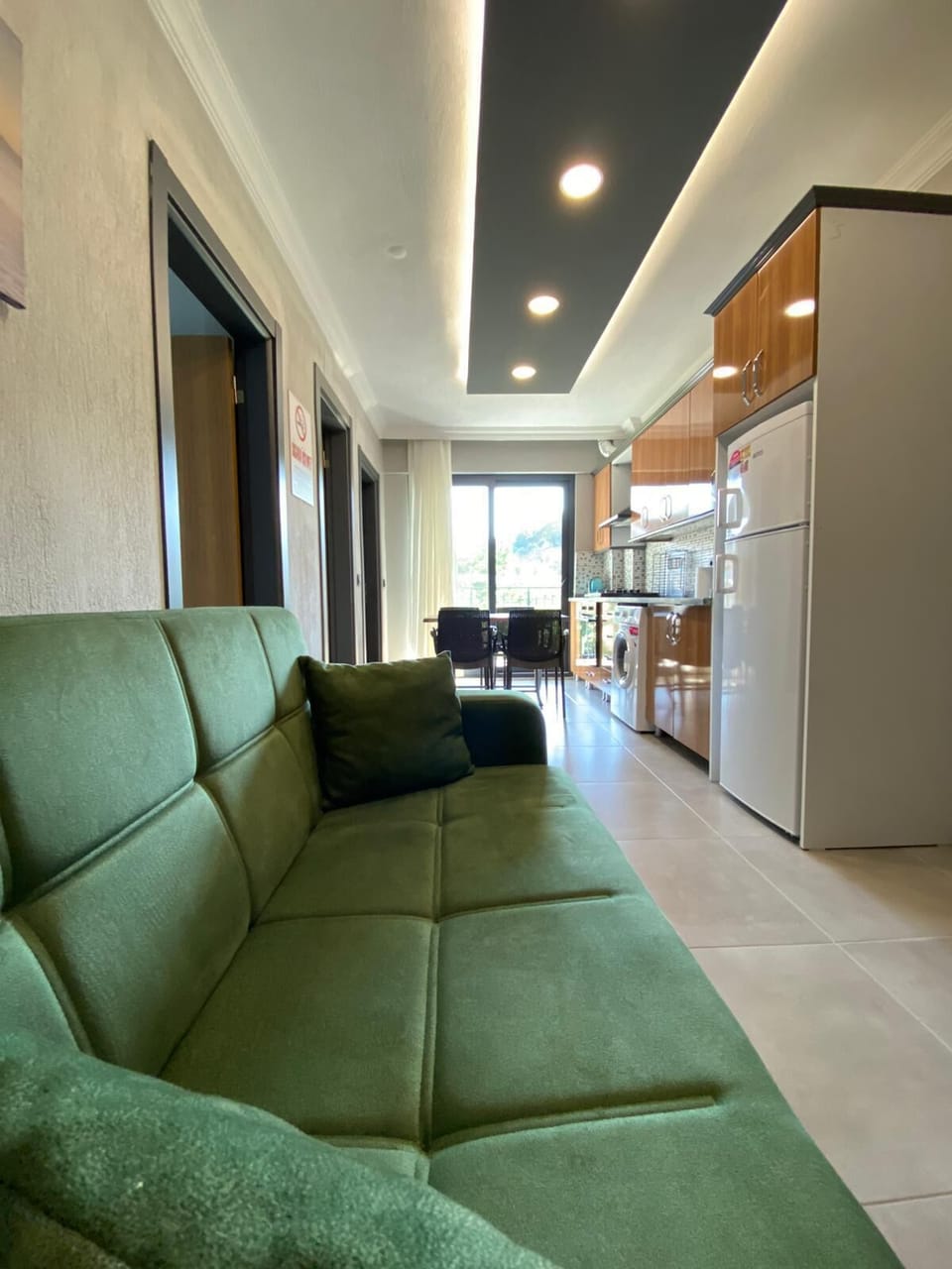 Deluxe Apartment, Balcony, Pool View | Living area | TV
