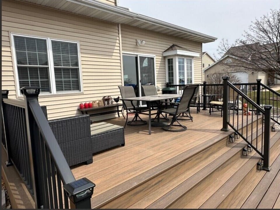 Deck on back of house facing the water