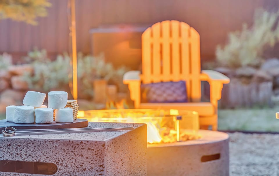 Gather under the stars around the glowing fire pit—perfect for roasting s’mores,