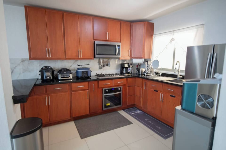 The kitchen is well equipped with state of the art fine modern machines all new 