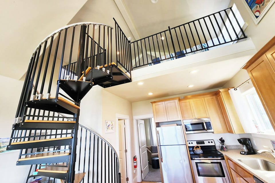 Spiral staircase takes you to the loft.