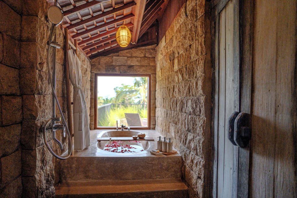 Hoshi Royal Villa | Bathroom | Hair dryer, slippers, soap, shampoo