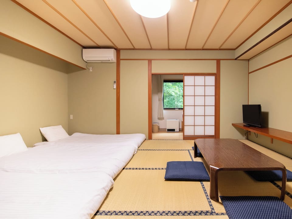 Japanese-style Triple Room, Non Smoking | Blackout drapes, WiFi (free), bed sheets