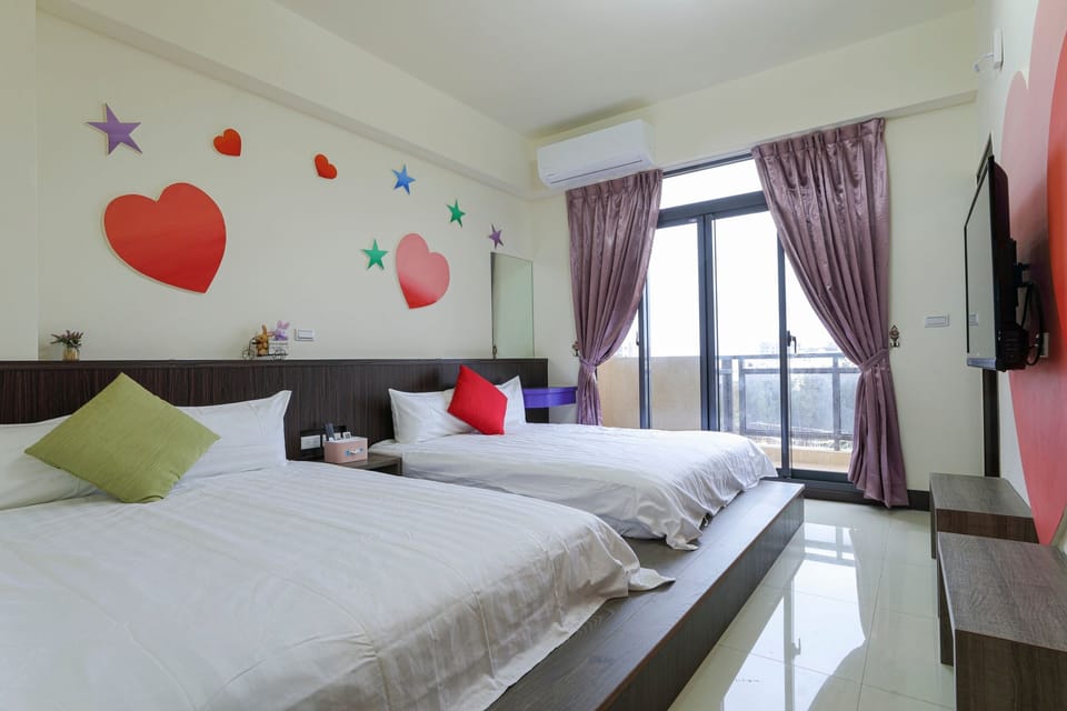 Comfort Quadruple Room, Balcony | Desk