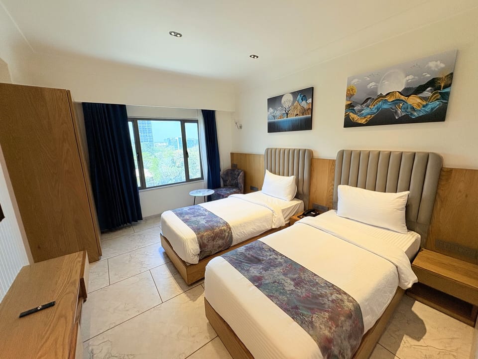 Standard Double or Twin Room, City View | In-room safe, soundproofing, iron/ironing board, free WiFi