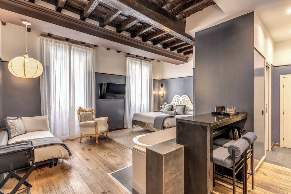 Luxury Triple Room, City View | In-room safe, desk, laptop workspace, soundproofing