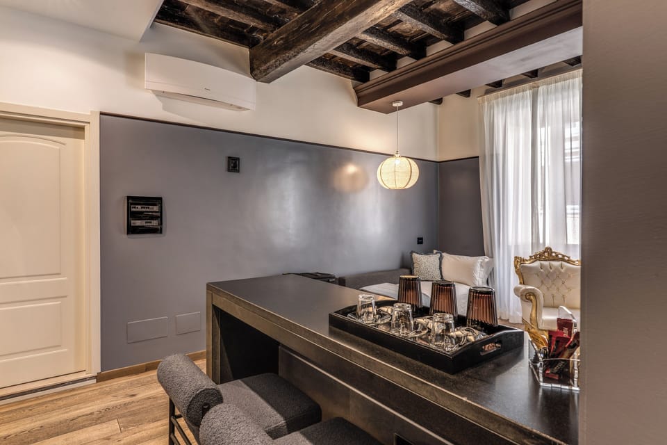 Luxury Triple Room, City View | In-room safe, desk, laptop workspace, soundproofing