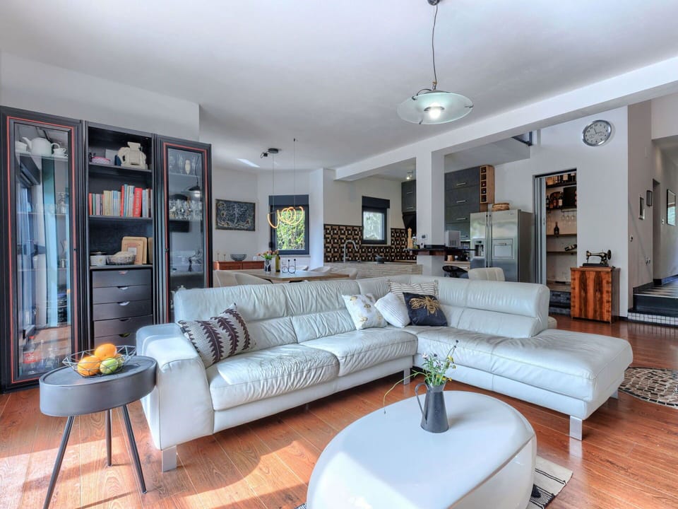Furniture, Interior Design, Couch, Flooring, Floor, Living Room, Wood, Ceiling, Room, Wood Flooring