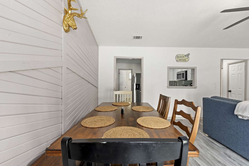 Enjoy a family dinner on this spacious dining room table