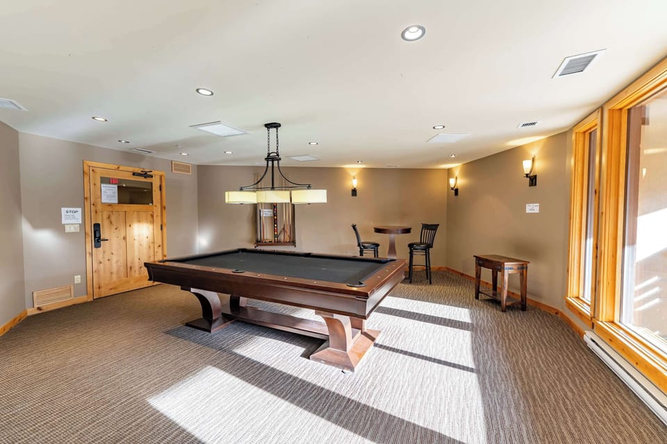 Games room with pool table