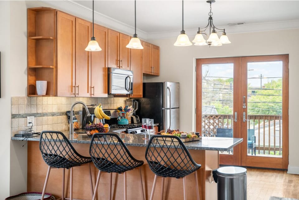 Enjoy casual meals, morning coffee, or evening chats at the sleek countertop!