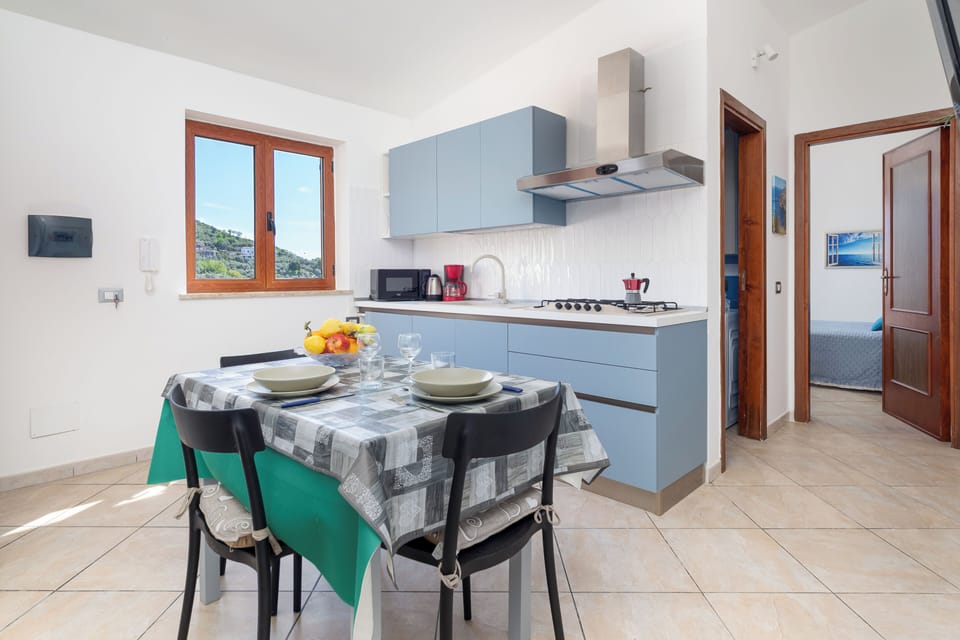 Panoramic Apartment, Sea View | Private kitchen | Coffee/tea maker, electric kettle