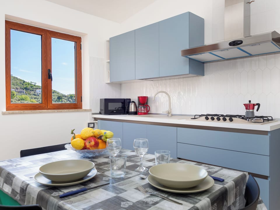 Panoramic Apartment, Sea View | Private kitchen | Coffee/tea maker, electric kettle