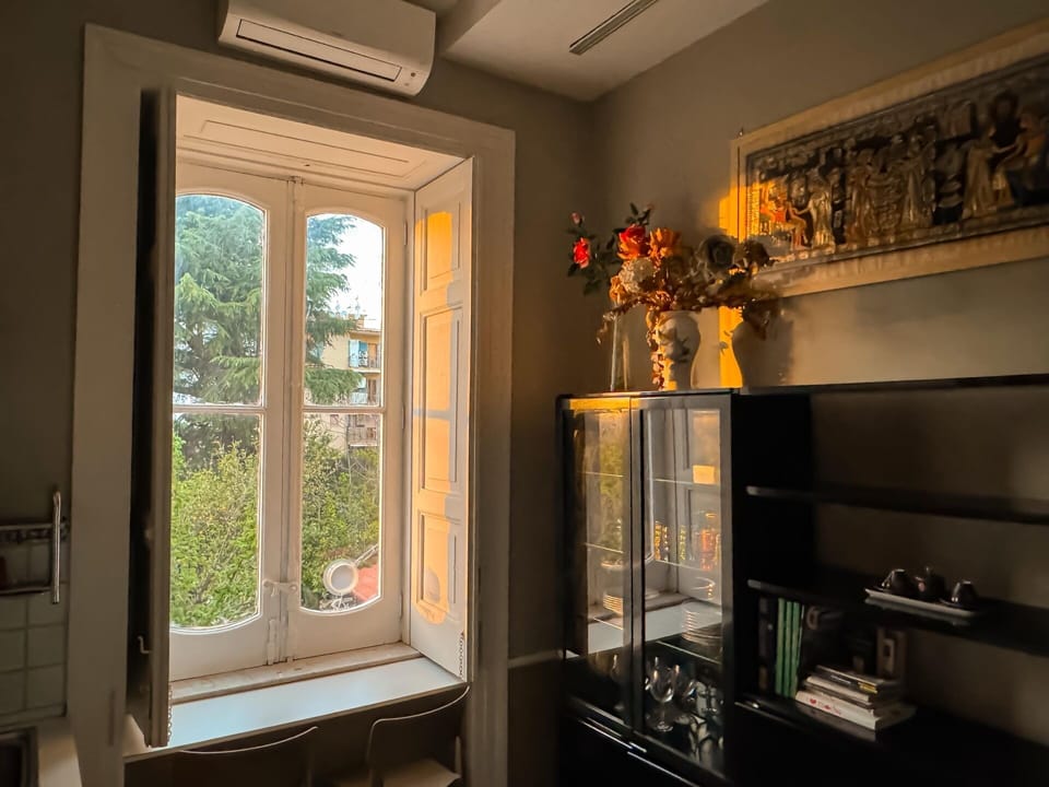 Apartment, City View | Living area | 32-inch flat-screen TV with digital channels