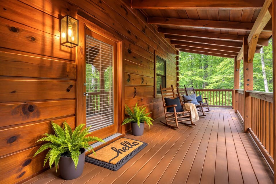 Start your mornings or end your evenings on the covered front porch, where classic rocking chairs and serene forest views invite you to slow down and savor the moment.