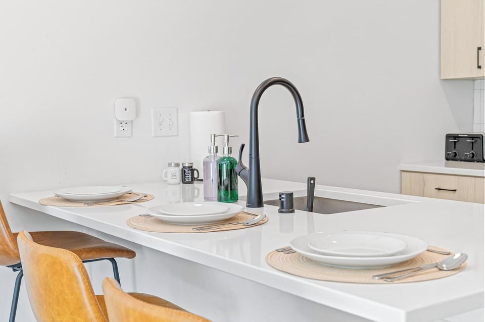 Modern kitchen island with stylish seating and sleek dining setup