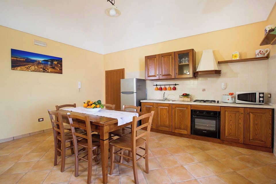 Panoramic Apartment, Sea View | Private kitchen | Fridge, oven, stovetop, coffee/tea maker