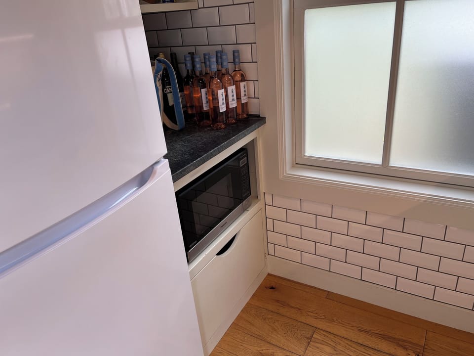 Pantry with second refrigerator and microwave