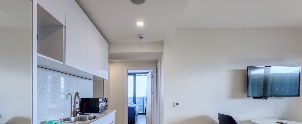 Luxury Suite, 2 Bedrooms | Desk, laptop workspace, blackout drapes, soundproofing