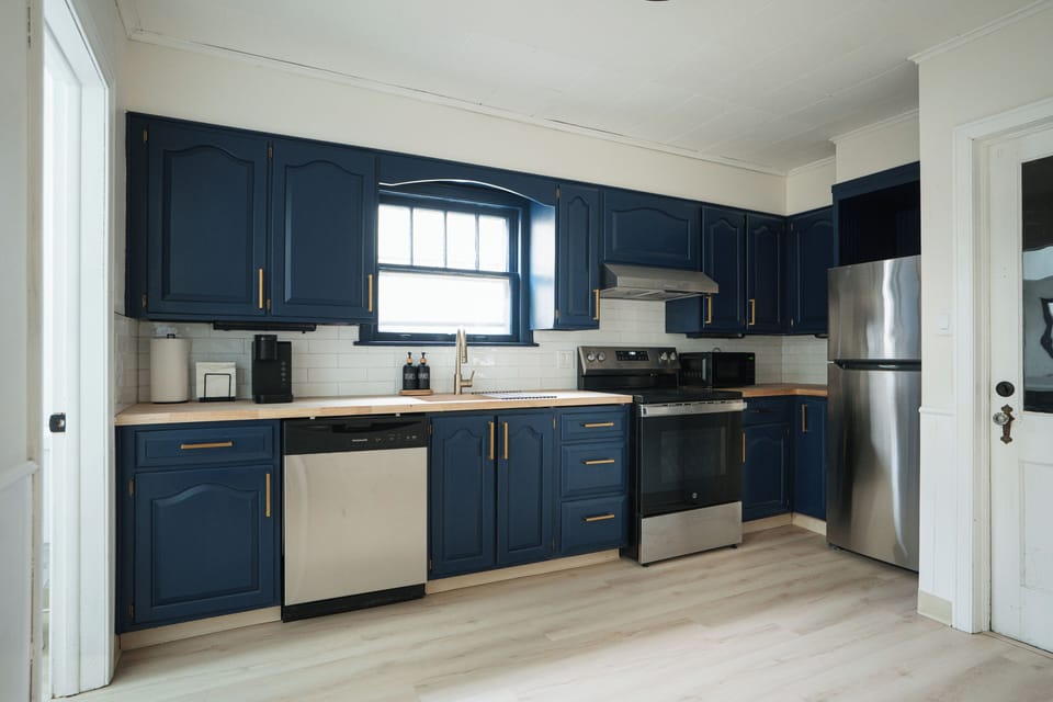 Kitchen fully stocked and equipped with all cooking needs and coffee.