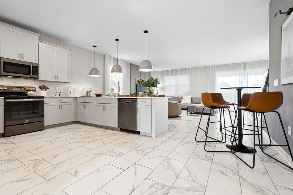 Welcoming kitchen with abundant countertop space complete