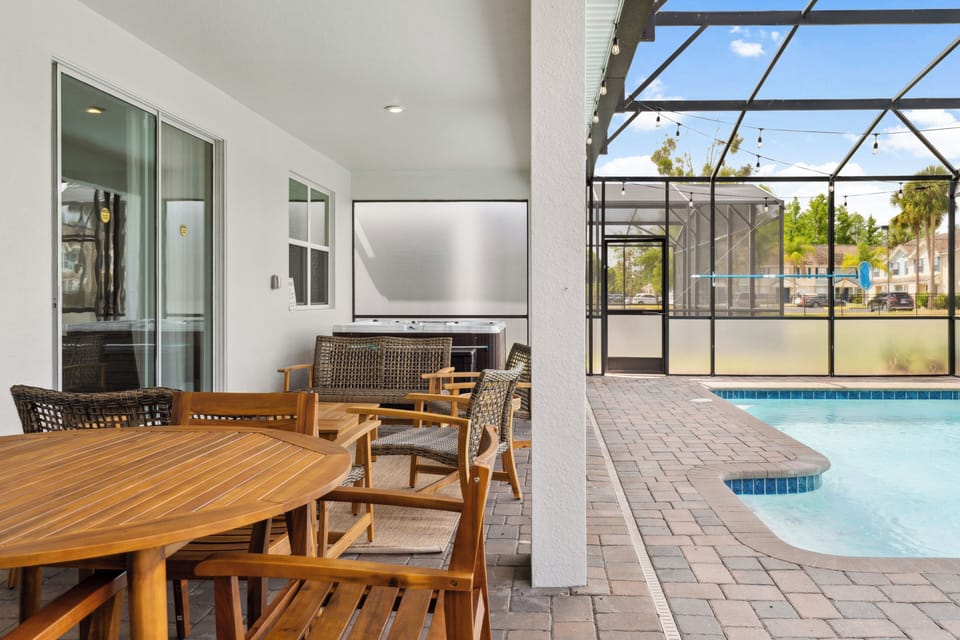 This outdoor area includes garden furniture and dining table