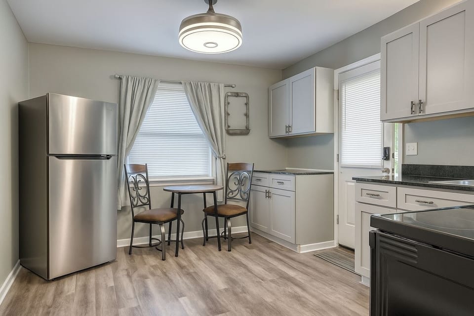 Convenient kitchen equipped with essentials for preparing light meals and snacks.