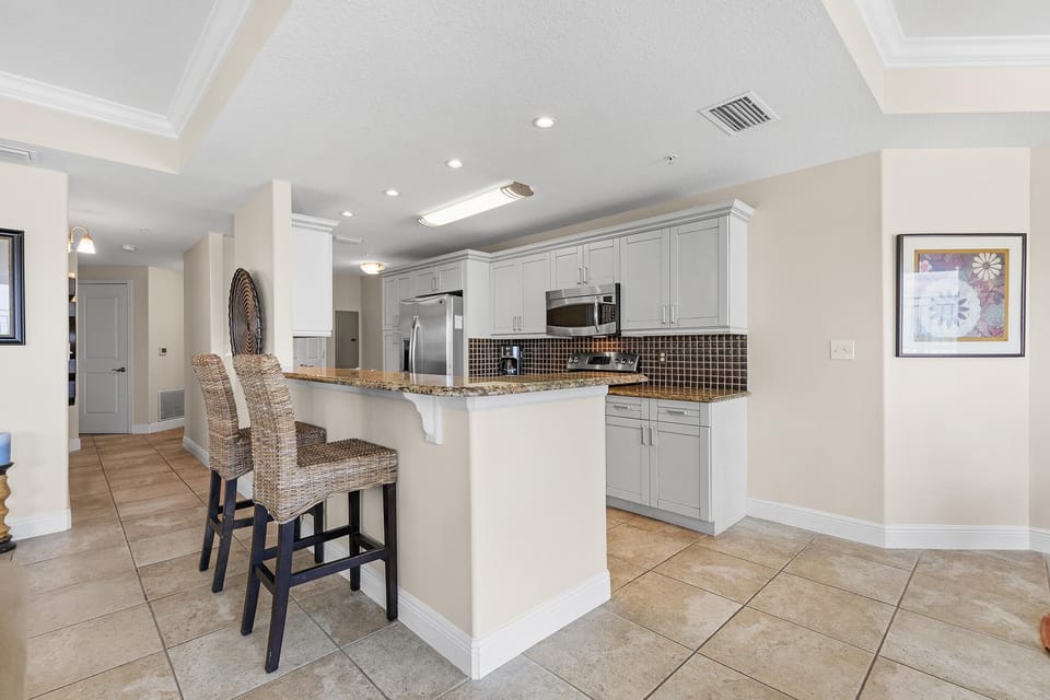Condo, Multiple Beds (The Wave 202) | Private kitchen | Oven, coffee/tea maker, toaster, blender