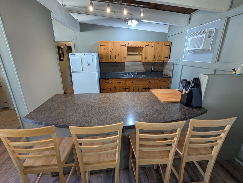 The kitchen island is perfect for casual meals, morning coffee or gathering